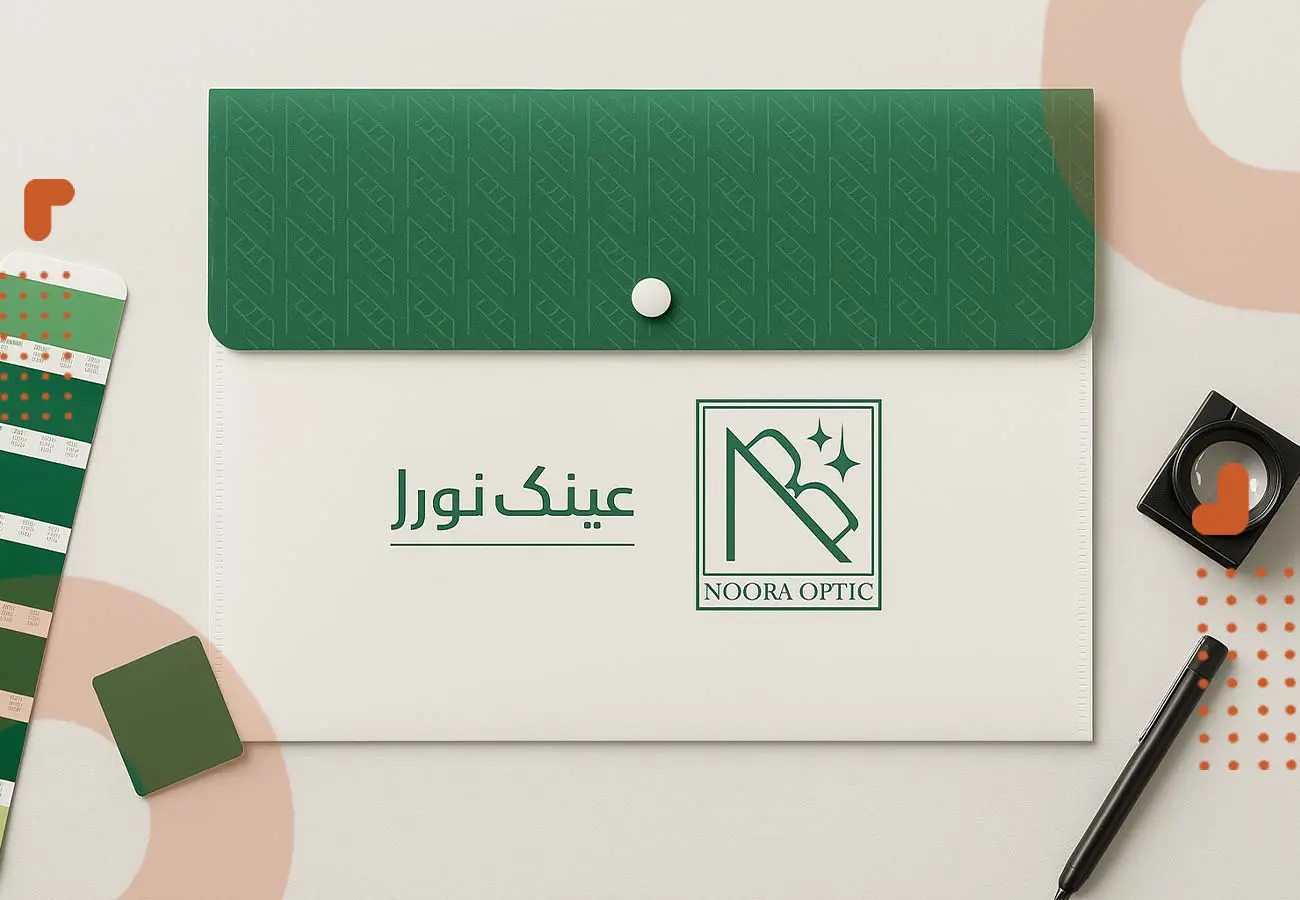 تصویر پاکت پزشکی عینک نورا به رنگ سفید و درب سبز با دکمه ی سفید رنگ- از جنس کاغذ سنگی: بهترین جنس کاغذ برای پاکت